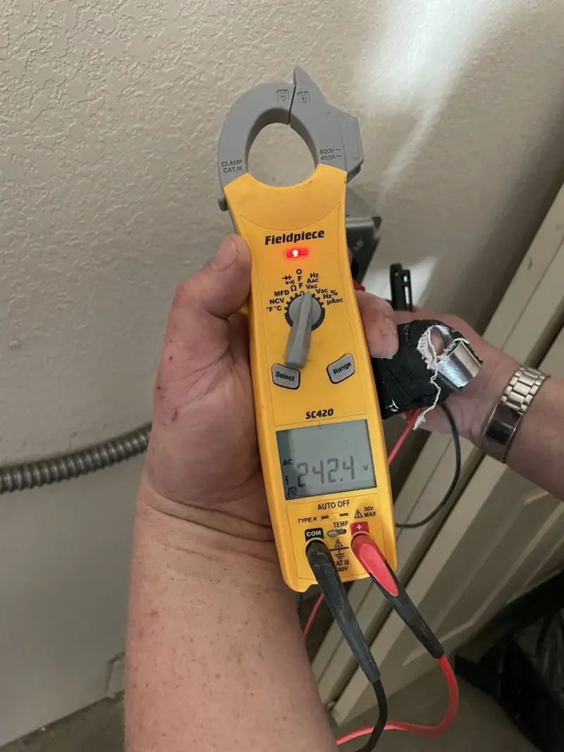 Voltage testing with clamp meter during Aluminum Wiring Replacement in Hudson Bend